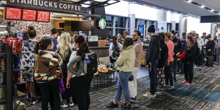 Can Starbucks fix long lines at its airport cafes?