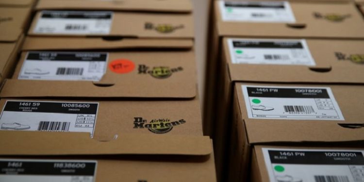 Dr. Martens rallies despite swinging into loss, new CEO to take helm