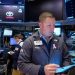 Futures dip as caution prevails ahead of inflation data