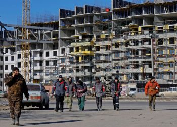 Analysis-Russia’s labour shortage spreads as defence sector poaches staff