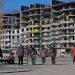 Analysis-Russia’s labour shortage spreads as defence sector poaches staff