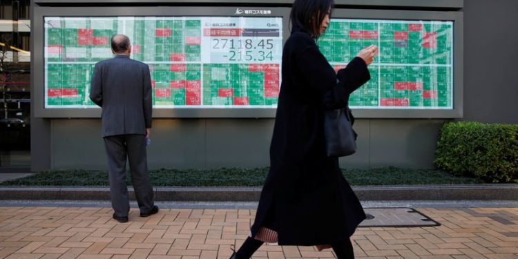 Asian shares slip, yen aims for best week in 4 months on BOJ hike bets