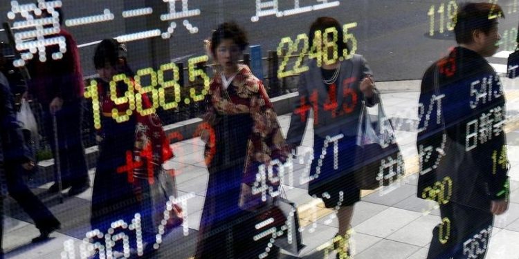 Asia stocks rise on upbeat Chinese PMIs; Trump tariff threat limits gains