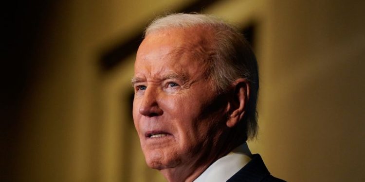 Biden to warn against another Trump tax cut, hail his own economic successes