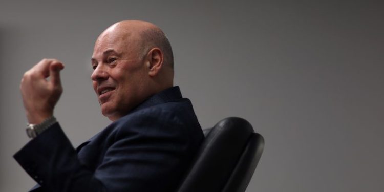 US Postal Service chief defends plan to buy rising number of EVs