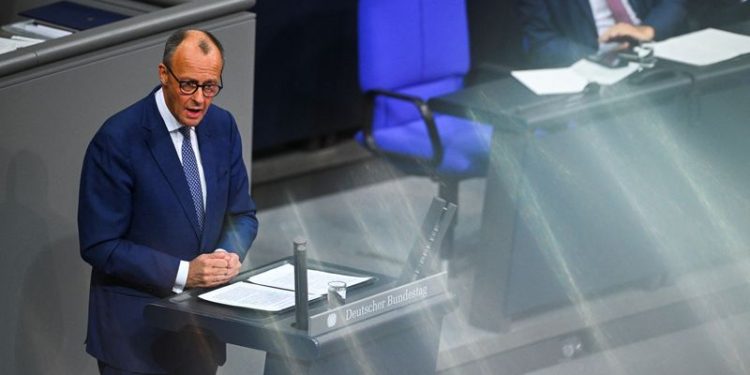 German chancellor frontrunner says will finance military without more borrowing