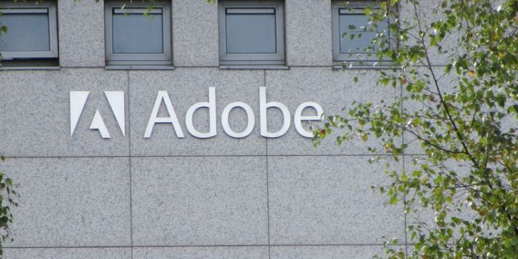 Adobe falls as annual revenue forecast triggers concerns on delayed AI returns