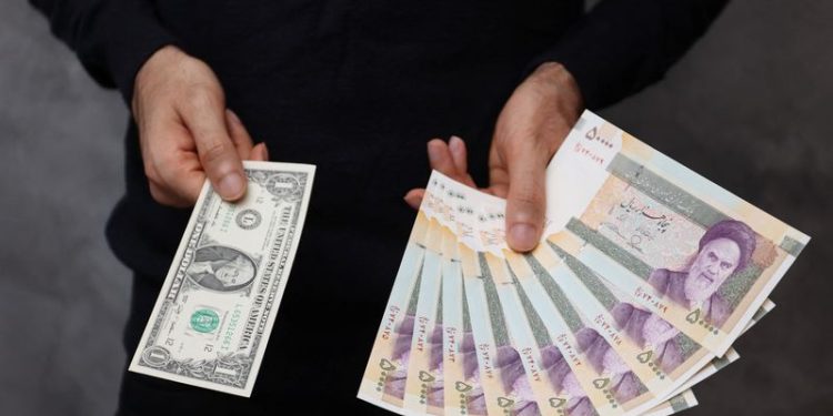 Iran currency slips to new lows amid U.S., Europe tensions