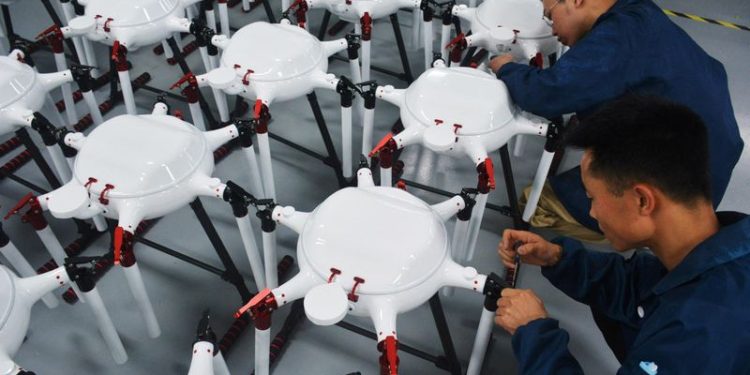 China November industrial output rises 5.4%, above expectations