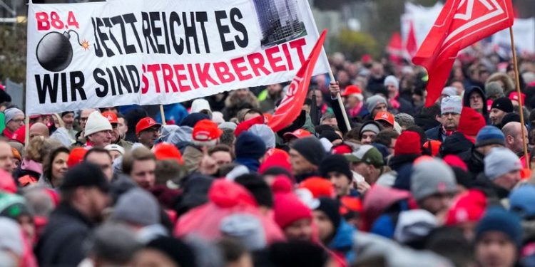 Talks between VW, unions over cuts continue into Wednesday, sources say