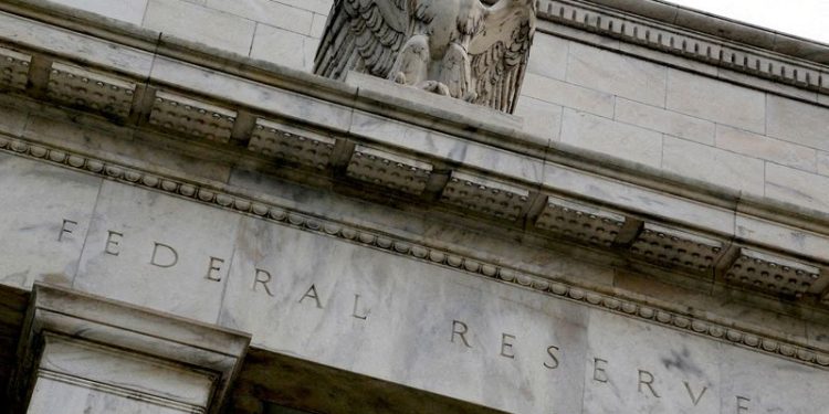 Fed cuts reverse repo rate by wider margin than funds rate target