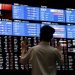 Asian stocks slide after Fed flags slower rate cuts, BOJ stands pat