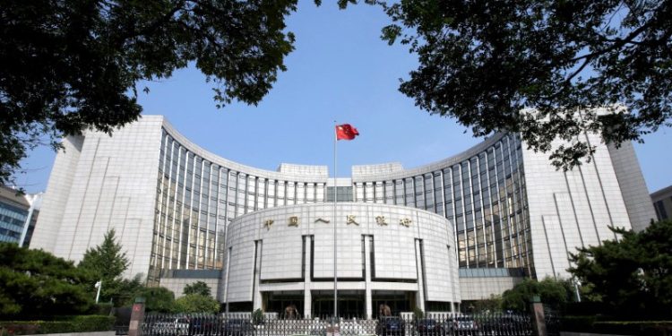 China leaves benchmark lending rates unchanged in Dec