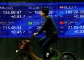 Asia shares dip as high yields test valuations