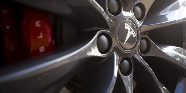 Tesla, Avago lead market cap stock movers on Monday