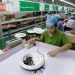 China Nov factory activity expands for second month as Trump threats loom