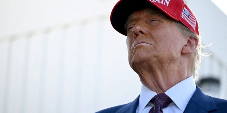 Trump warns BRICS nations against replacing US dollar