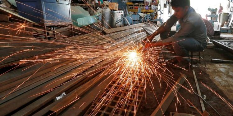 India factory growth softened in November on high inflationary pressures, PMI shows