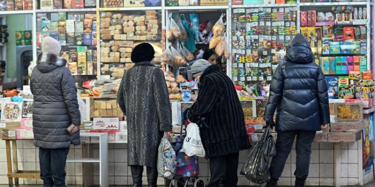 Exclusive-Top Russian banker says sanctions-hit economy will slow in 2025