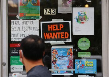US job openings rise in October, layoffs decrease