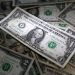 Dollar holds ground as Fed path pondered; won stable after martial law lifted