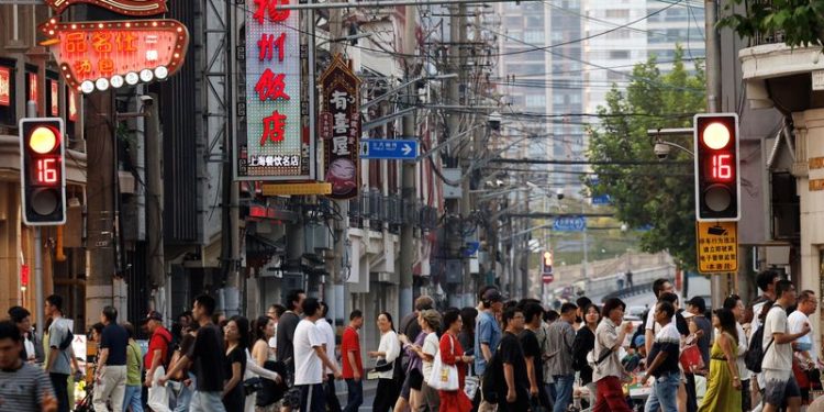 China’s services activity expansion eases in Nov, Caixin PMI shows