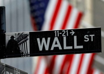 US stock futures muted after Wall St hits record highs on tech gains, Powell talk