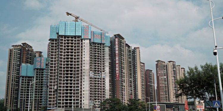 China December new home prices rise a touch faster, survey shows