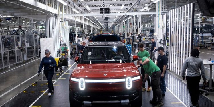 EV maker Rivian beats expectations for deliveries as supply snag eases
