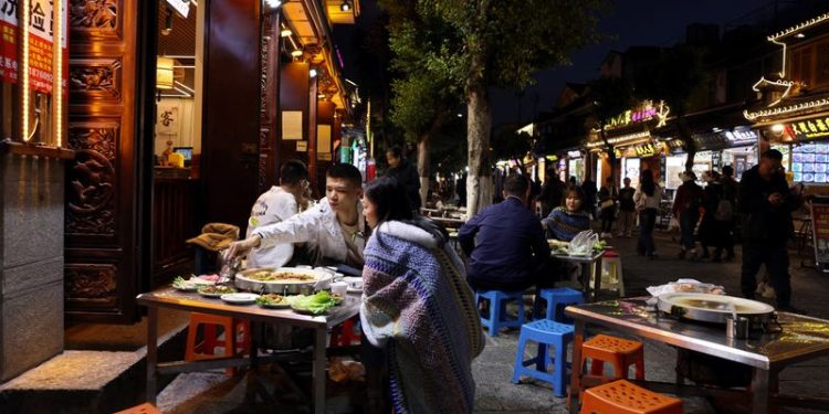 China services activity hits 7-month high but US trade fears dent optimism, Caixin PMI shows