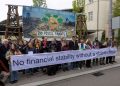 Analysis-Exodus by Wall Street banks from climate group worries advocates