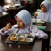 Indonesia dishes out first free meals in programme targeting 83 million people