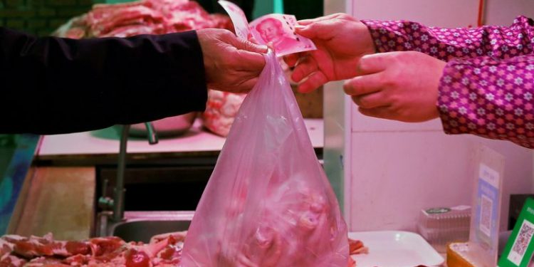 China’s consumer inflation slows in Dec