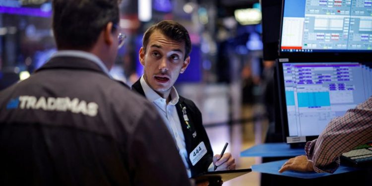 Futures drop on caution ahead of key payrolls data
