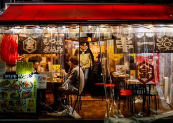 Japan’s service mood improves, rising costs cloud outlook