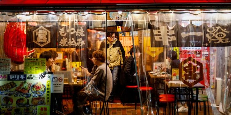 Japan’s service mood improves, rising costs cloud outlook