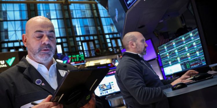 Wall St slips as focus shifts to earnings, consumer inflation data