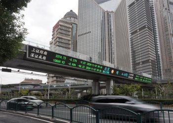 Analysis-Markets are betting China will let yuan fall as Trump takes power, but not much