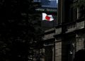 BOJ hikes interest rates by 25 bps, sees slower growth and higher inflation