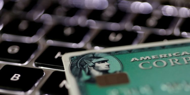 Intuitive Surgical, American Express Stir Friday’s Market Cap Stock Movers