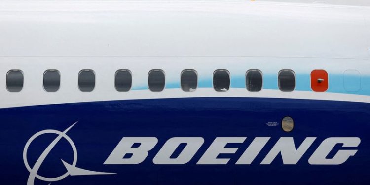 Boeing forecasts bigger-than-expected quarterly loss on defense troubles, strike hit