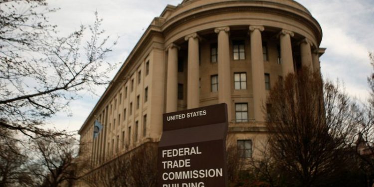 Exclusive-FTC chairman says COVID is long over, get back to the office