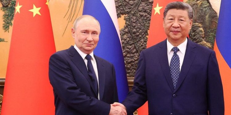 Trump claims Putin, Xi, Kim are conspiring against the US after military parade in China